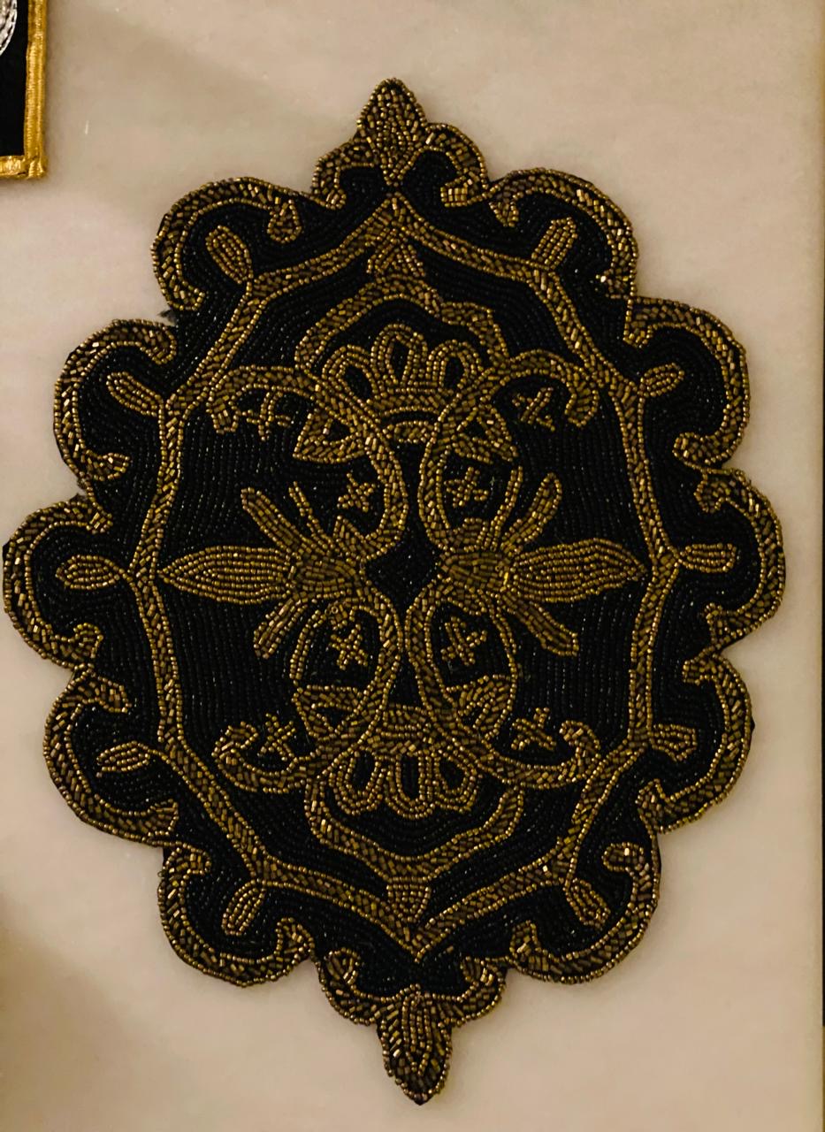 Luxurious Black Table Mat with Golden Beaded Border